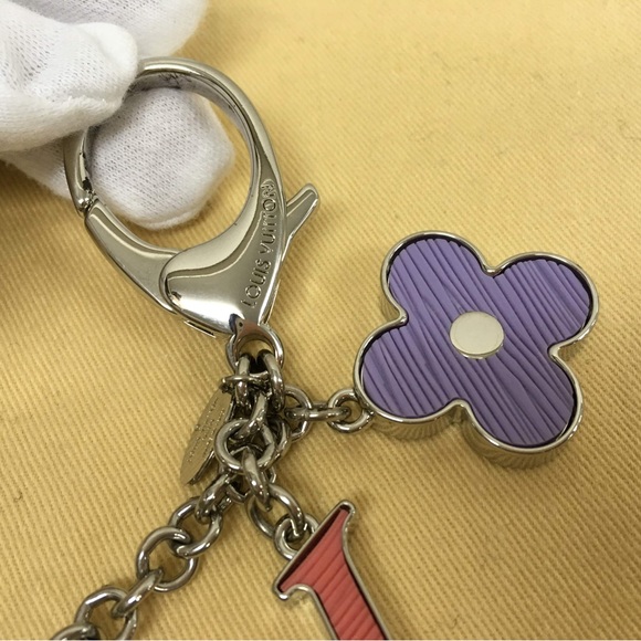 Authentic Louis Vuitton FLEUR D'EPI BAG
CHARM. - Picture 5 of 10